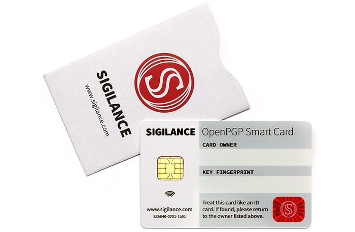 The SIGILANCE OpenPGP Smart Card next to its RFID-blocking sleeve, both printed with the SIGILANCE logo.